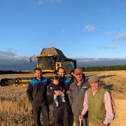 FOUR GENERATIONS of one family are captured in this picture on their last day of combining Laureate spring barley earlier in the autumn. From right, they are John Zimmerman (96) with son John, grandson Kevin with great grandson Cole, and grandson Craig,