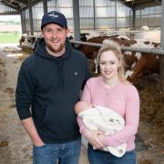 Lawrie famly at Myremill, Kevin, Alison and Lottie (10 days old) Ref:RH060622134  Rob Haining / The Scottish Farmer...