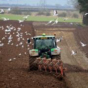 A farmer ploughs a field in North Yorkshire. Organised crime gangs are stealing farm machinery and GPS kits worth tens of thousands of pounds to sell on in the UK and abroad, an insurer has warned