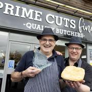 John Gibson (left) and John Kennedy from Prime Cut Butchers in Ayr pictured with his trophy after being named Scottish Craft Butchers Traditional Steak Pie Champion for 2023