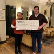 Borders and Midlothian Blackface Sheep Breeders Association president James Hamilton was pleased to present Scottish Borders RHET coordinator, Ann Redpath with a cheque for £510, recently.