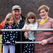 Peter Junor with partner Jennifer and daughters Megan and Marie  Ref:RH150324034  Rob Haining / The Scottish Farmer...
