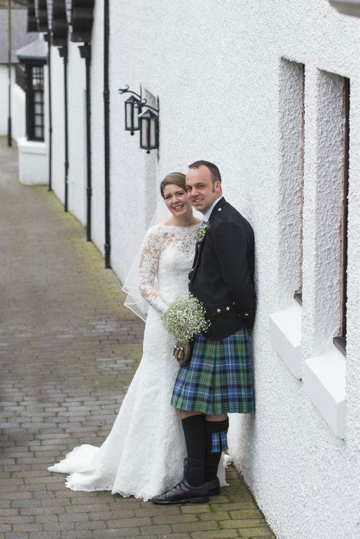 Married at the Brig O Doon House Hotel are Kay McClymont of Mid Curghie, Drummore, and David Templeton of Carslae, Wigtown. Photo: Paul Walker Images.