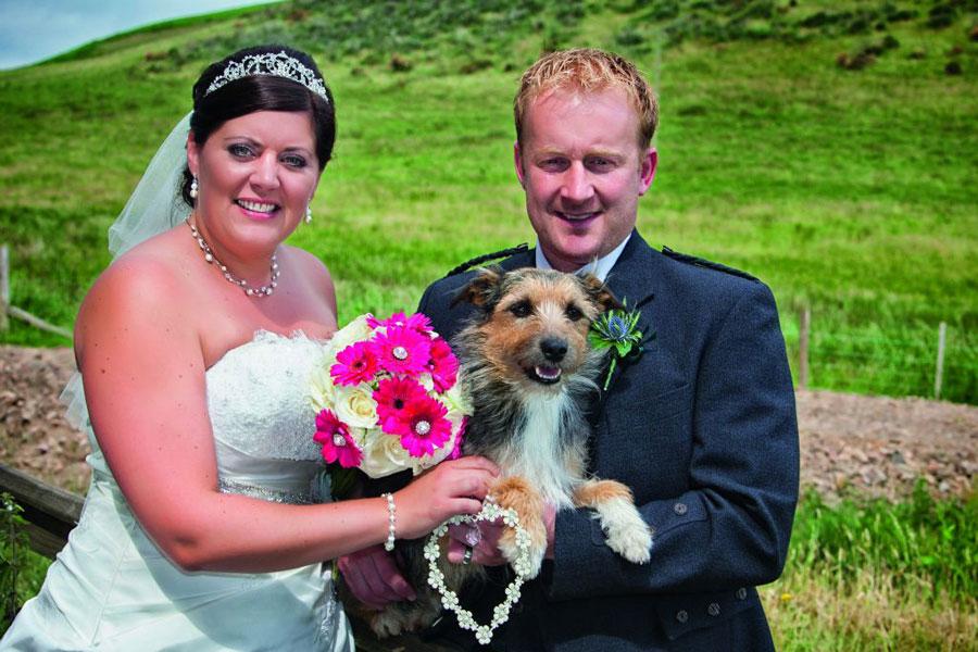 Laura and Stuart Weir, of Mainside Farm, Hownam, were married at The Carfraemill. Photo: Brian Cassidy Photography.