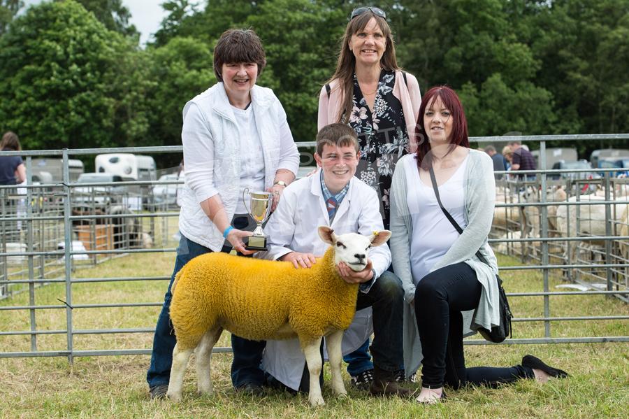 Young handler champion Fraser Dandie(centre) receiving the Jack McIntosh trophy from Shona Stewart, Morag Brownand and  Caryn Brown. Ref: RH17617349