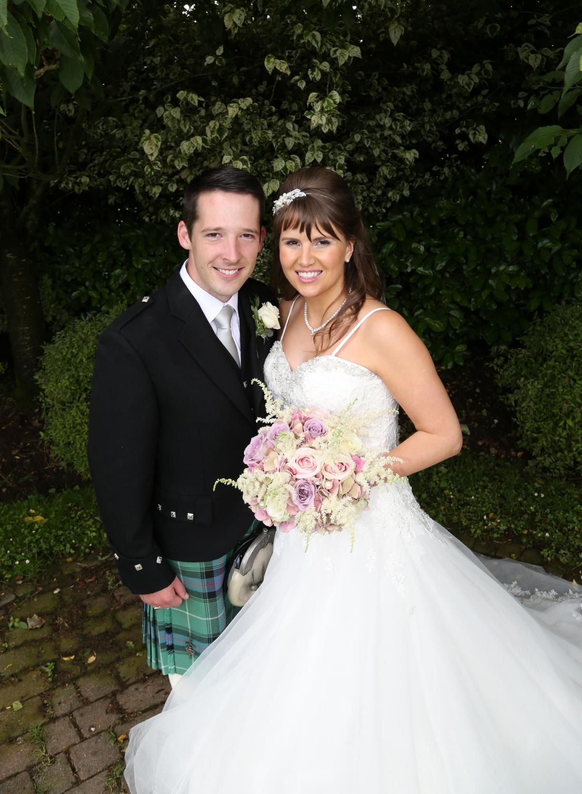 Valerie Neil of Tarbolton and Greg Philp from Barassie, Troon, were married at Tarbolton Parish Church. Photo: Ryan Mimiec Photography
