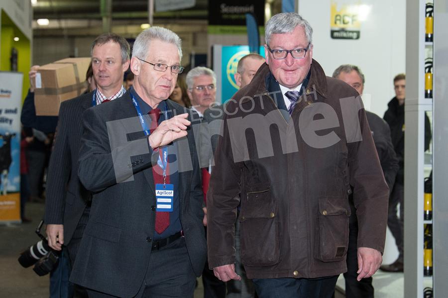 Chairman Andrew Moir taking Fergus Ewing, Cabinet Secretary for the Rural Economy and Connectivity a tour round Agriscot. Ref: RH1511170166.